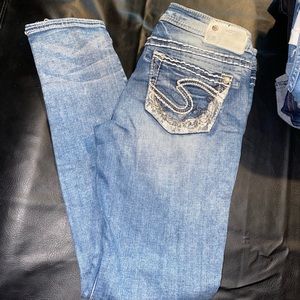 Silver skinny jeans size 26/29
